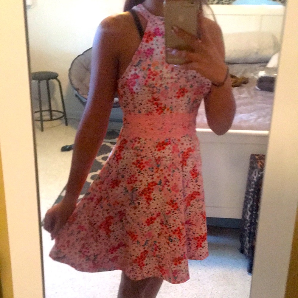 Pink dress with flowers.